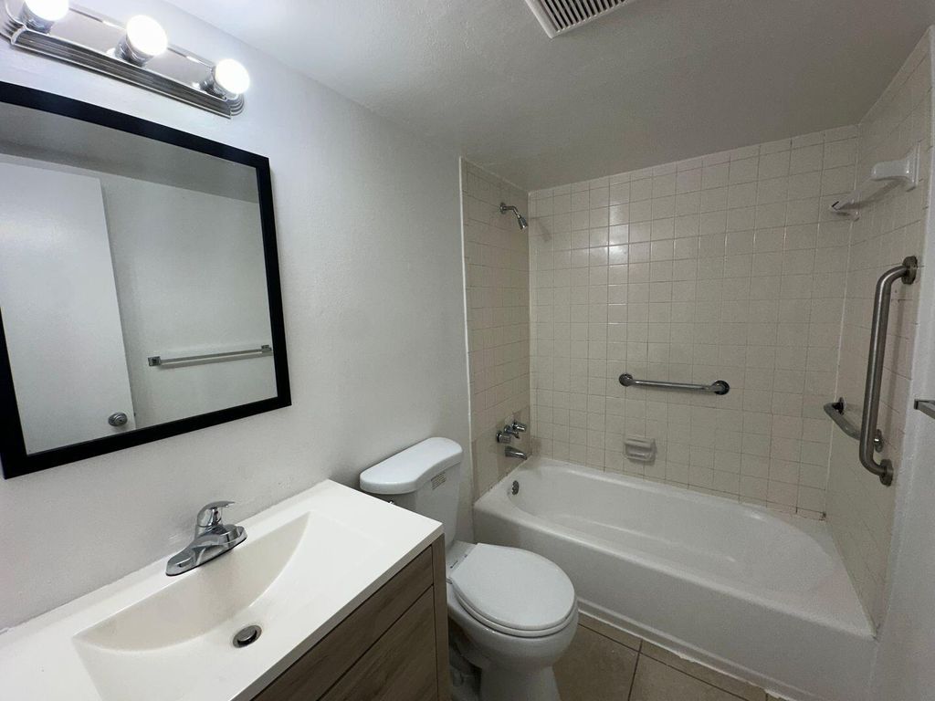 Photo of 515 S Sequoia Drive #111, West Palm Beach, FL 33409 (MLS # B26040536)