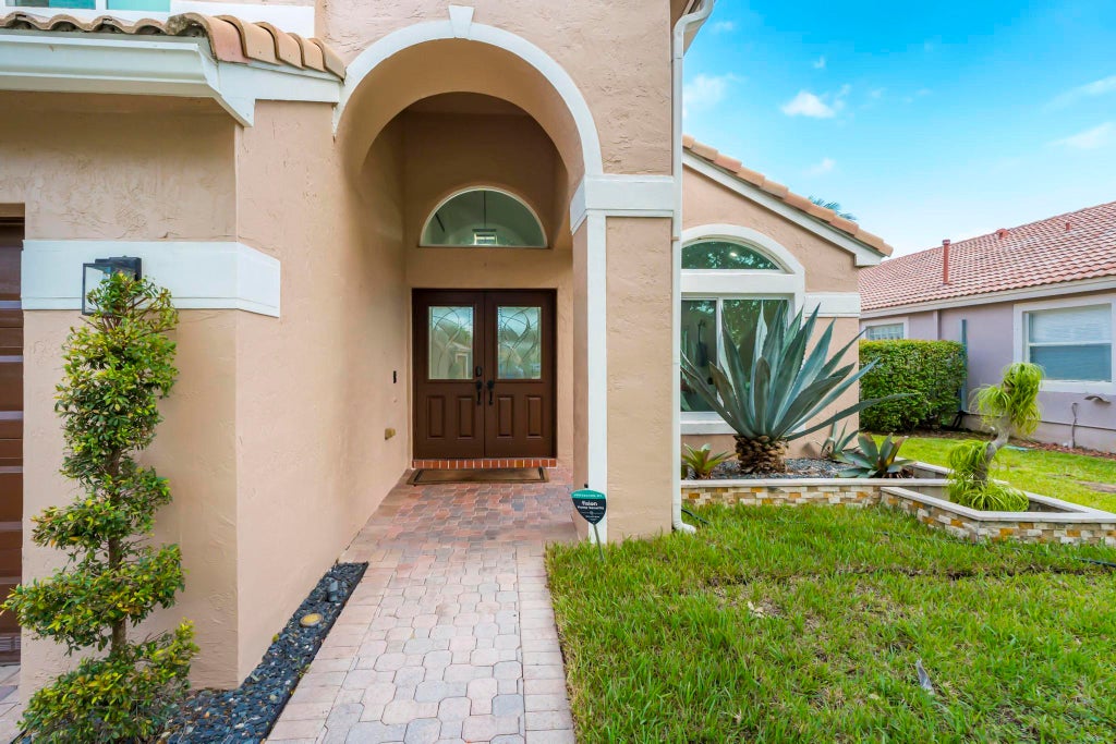 Photo of 1551 NW 132ND Avenue, Pembroke Pines, FL 33028 (MLS # B26077419)