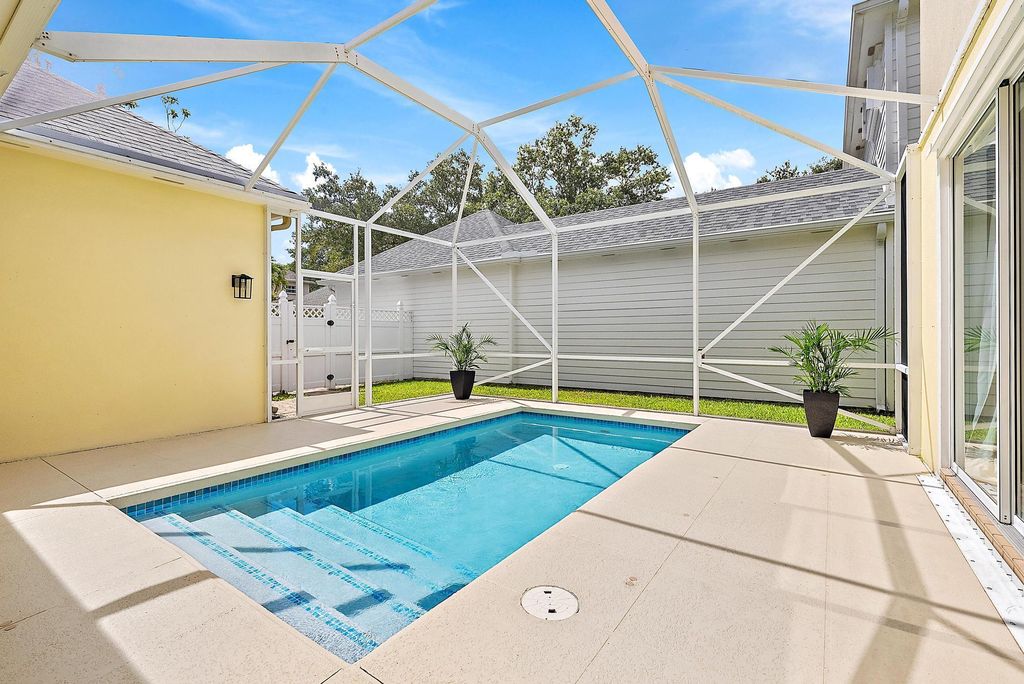 Photo of 121 Newhaven Boulevard, Jupiter, FL 33458 (MLS # R11105893)