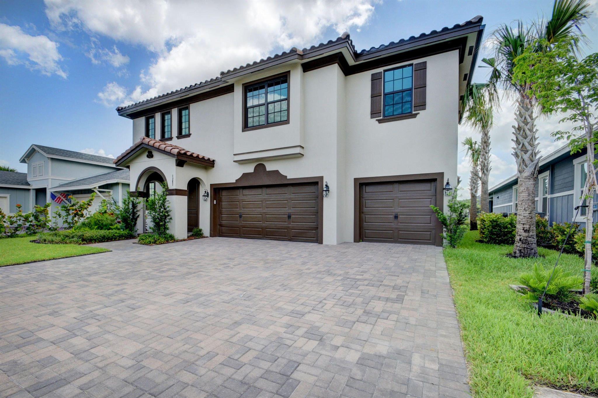 Stunning single-family home located in luxurious Arden. This unique 5 bedroom model won't last! Home was built in 2021! Spacious up to date rooms and a large fenced in yard. This beautiful community offers a resort style swimming pool, a state of the art gym, a community barn with locally grown food, a splashpad for the little ones, kayaking and more. Easy access to highways, A rated schools, just minutes from Lion Country Safari! Schedule your showing today!