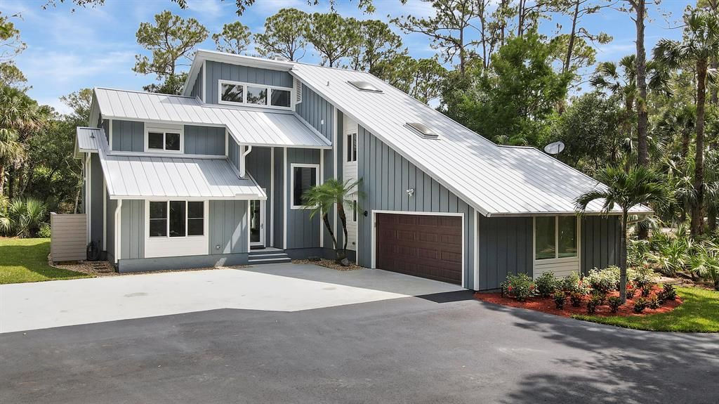 Photo of 4750 SW Country Place, Palm City, FL 34990 (MLS # R10723876)