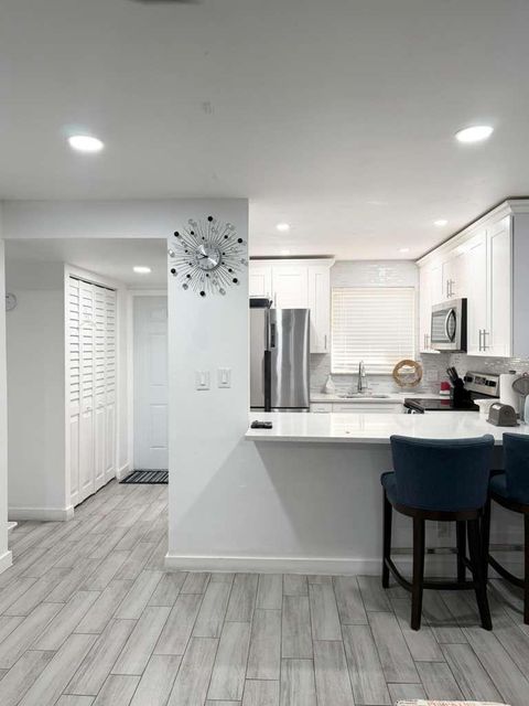 Photo of 2950 W Sunrise Lks Dr #106, Sunrise, FL 33322 (MLS # F10538664)