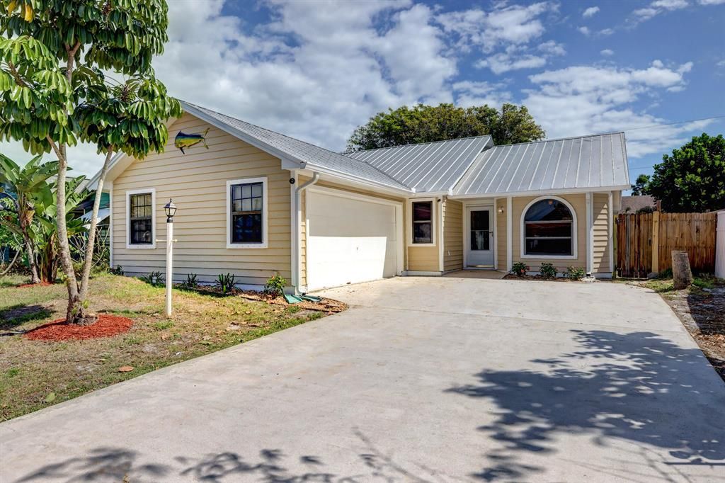 Photo of 5869 SE Tangerine Boulevard, Stuart, FL 34997 (MLS # R10696940)