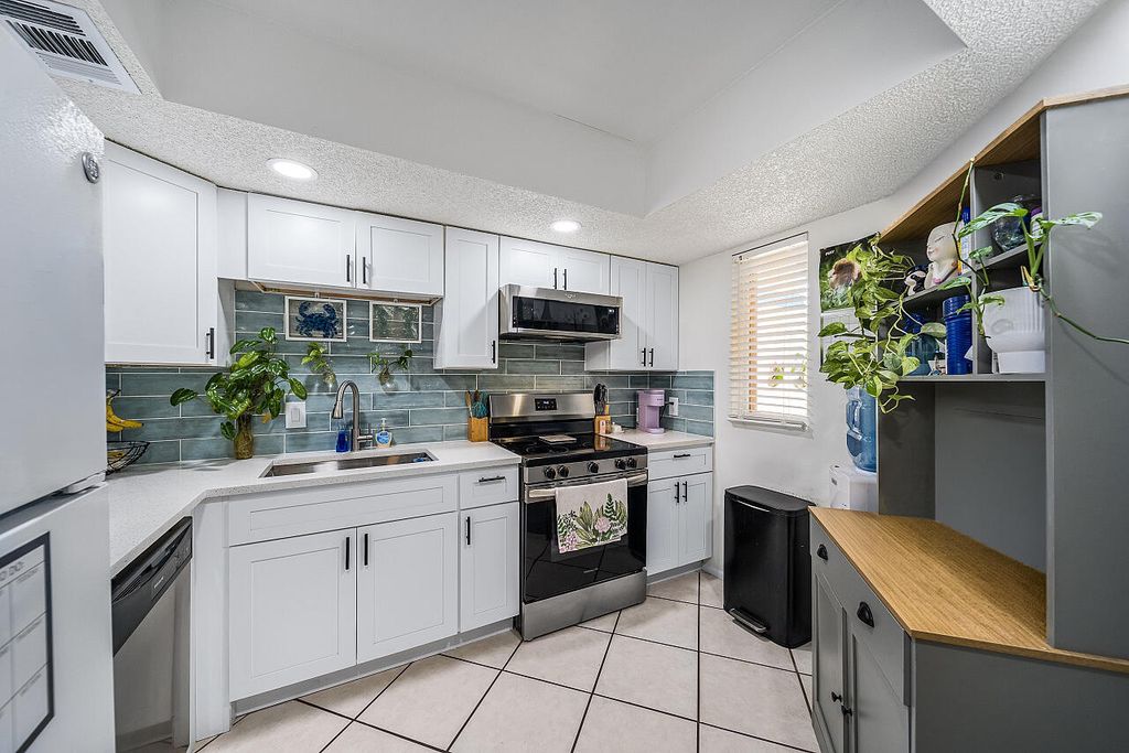 Photo of 1507 SE Royal Green Circle #102, Port Saint Lucie, FL 34952 (MLS # B26033500)