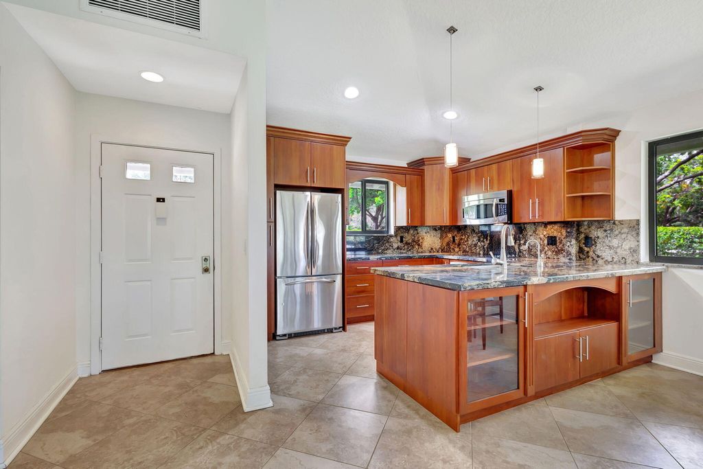 Photo of 908 Club Drive #908, Palm Beach Gardens, FL 33418 (MLS # R11131839)