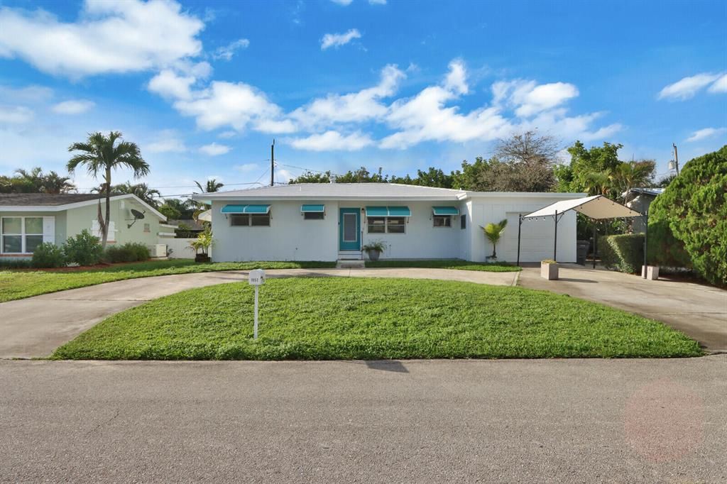 Photo of 1952 Circle Drive Dr, North Palm Beach, FL 33408 (MLS # R10693727)