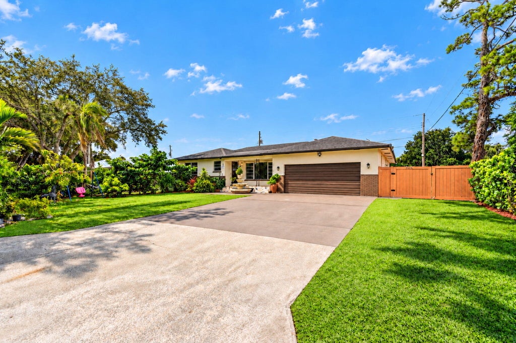 Photo of 4306 Waterway Drive, Lake Worth, FL 33461 (MLS # B26093091)