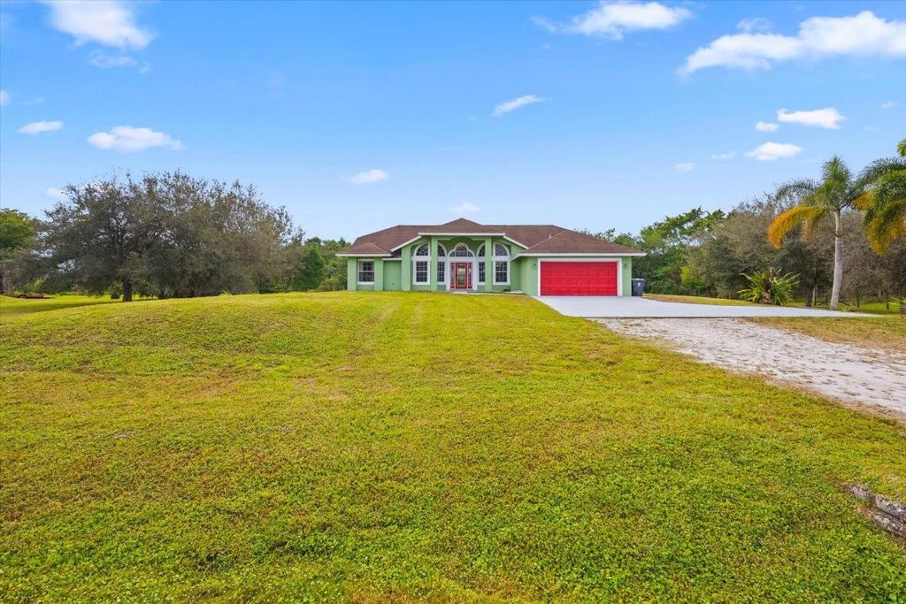 Photo of 17714 35th Place N, The Acreage, FL 33470 (MLS # R10946925)
