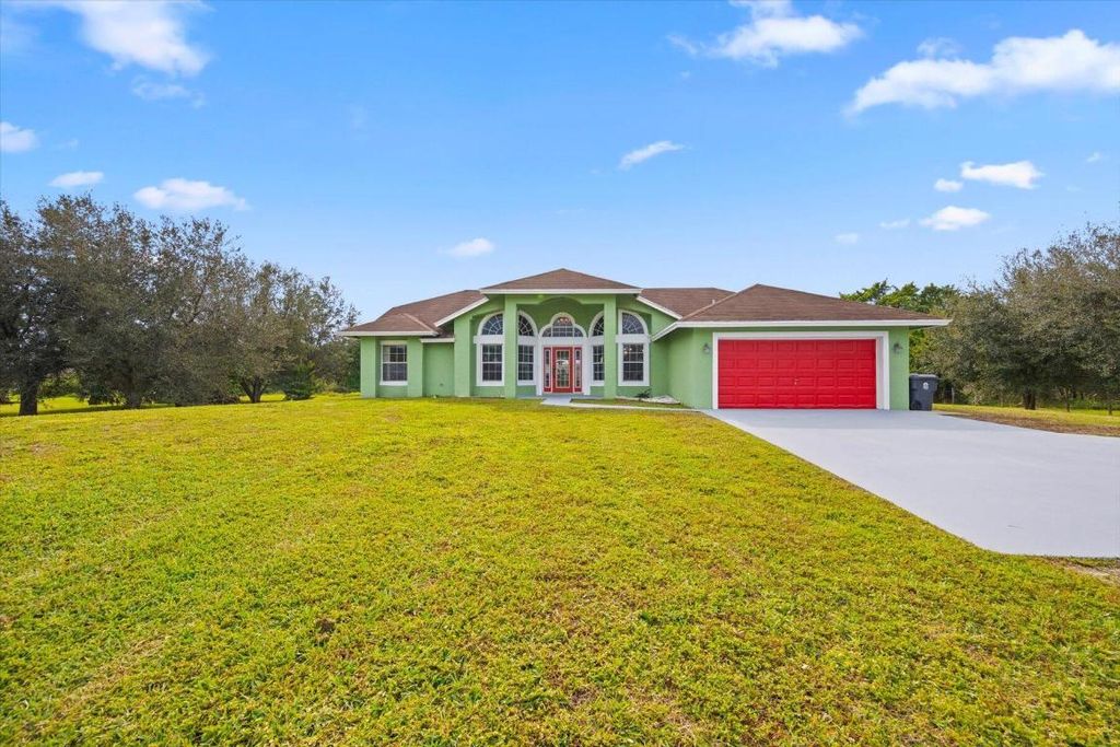 Photo of 17714 35th Place N, The Acreage, FL 33470 (MLS # R10946925)