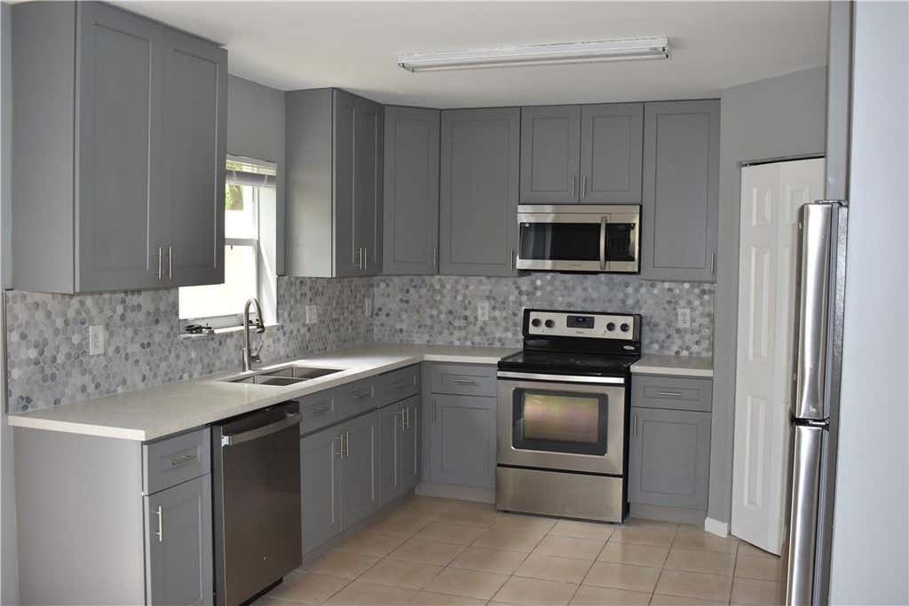 Photo of 1199 Imperial Lake Road, West Palm Beach, FL 33413 (MLS # F10514750)