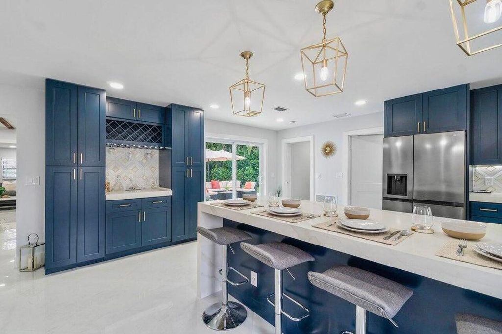 Photo of 324 Bamboo Road, Palm Beach Shores, FL 33404 (MLS # R11155695)