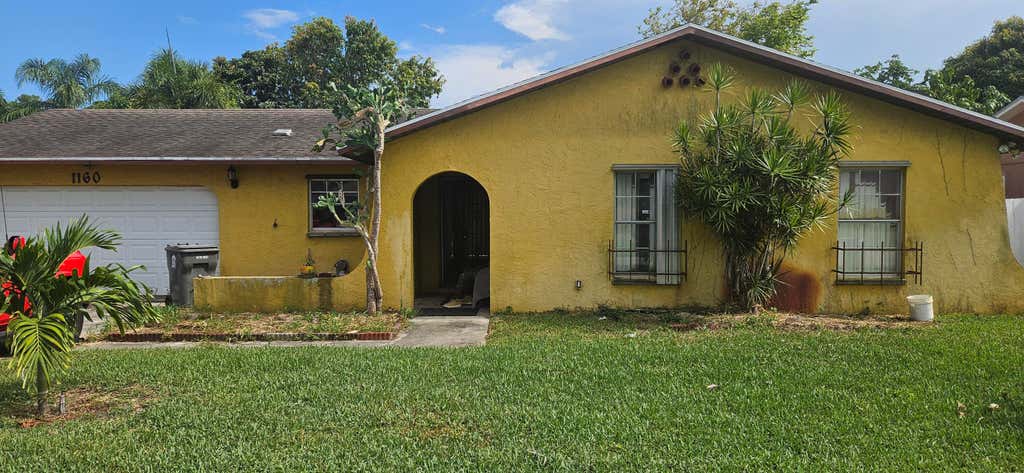 Photo of 1160 Fernlea Drive, West Palm Beach, FL 33417 (MLS # R11094338)