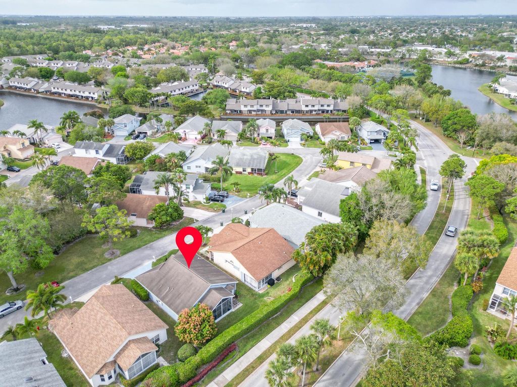 Photo of 129 Hammocks Drive, Greenacres, FL 33413 (MLS # R10966420)