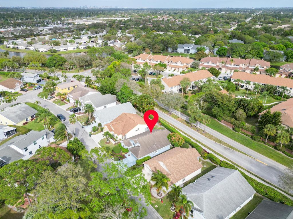 Photo of 129 Hammocks Drive, Greenacres, FL 33413 (MLS # R10966420)