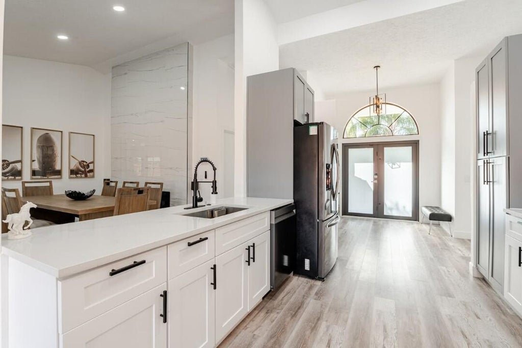 Photo of 1860 Primrose Lane, Wellington, FL 33414 (MLS # B26025705)