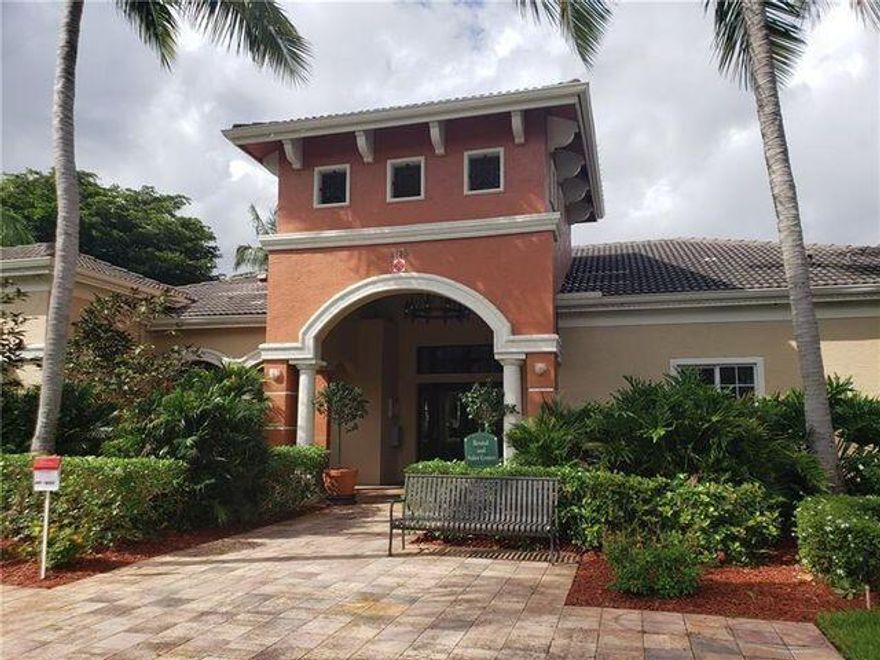 Great location with a nice view from the patio of the lake.Newly painted  througout with wood floors . GYM,Community pool .Gated community close to ll shopping needs