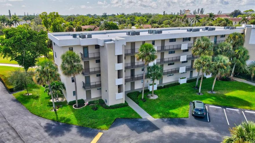 Massive remodel, nothing to do but move in & enjoy. Completely renovated in 2016 (all under permit). Included in the extensive remodel, from the new drywall, insulation & backer board out~impact windows, impact French balcony door & front exterior door~Whisper mat and porcelain tile throughout~All plumbing and electric~ Water heater~Custom extended kitchen with custom pantry & slow close cabinets & drawer~Marble Calcutta counters and island~SS LG appliances, convection oven, microwave & dishwasher~Water closets,  vanities and baseboards~Recessed lighting~Solid wood doors~Barn door at second bedroom~Washer/Dryer hook-up in primary bedroom.  Great golf course view from the screened balcony.   Amenities include clubhouse, heated pool, fitness, tennis, BBQ grills, gym, shuffleboard & more. Deer Creek Country Club is a public golf club, no equity purchase is required.  Pay as you play.  Enjoy the bar and Grille Restaurant!