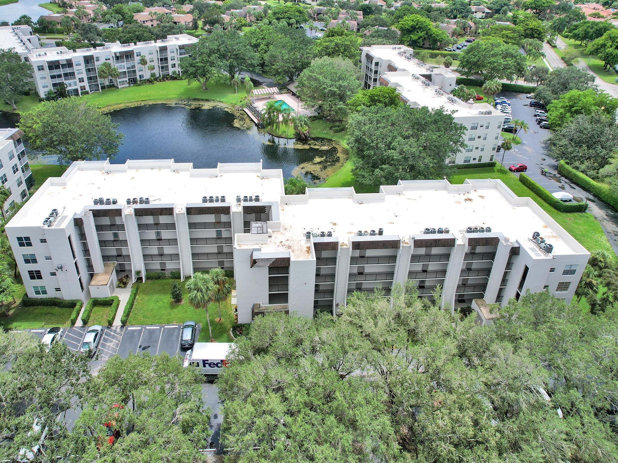 SUPER 1BR/1BA CONDO LOCATED IN A PRIVATE,  COUNTRY CLUB COMMUNITY. UNIT FEATURES UPDATED KITCHEN, BATHROOM, AND FLOORING. ENCLOSED 2ND-FLOOR PATIO OFFERS BEAUTIFUL POOL AND WATER VIEWS. NEWER A/C (2019). NEW ROOF 2022, NEW ELECTRICAL PANEL 2025, ENJOY RESORT-STYLE AMENITIES INCLUDING EXECUTIVE GOLF COURSE, TENNIS, PICKLEBALL, BOCCE BALL, SAUNA, STEAM ROOM, GYM, HEATED POOL WITH POOLSIDE SPORTS BAR, AND FINE DINING RESTAURANT. CLOSE TO I-595, SHOPPING, DINING, AND MAJOR DAVIE COLLEGES /UNIVERSITIES. MOVE-IN READY AND PERFECT FOR YEAR-ROUND LIVING OR SEASONAL ESCAPE!