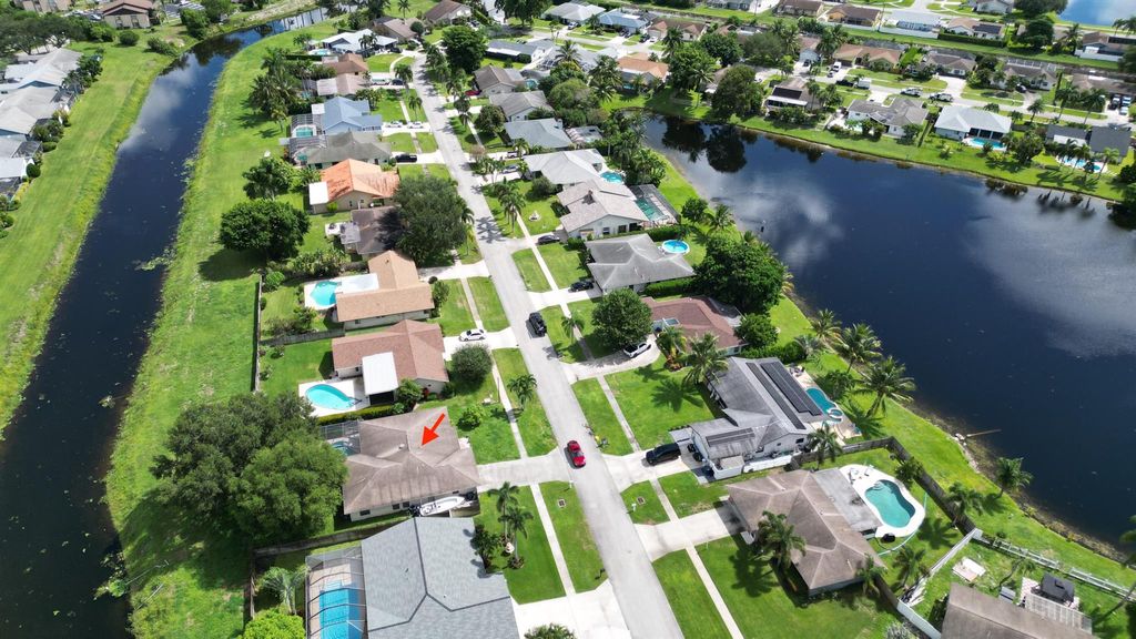 Photo of 5041 Woodstone Circle N, Lake Worth, FL 33463 (MLS # R11123950)