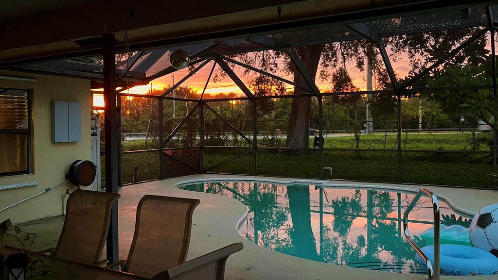 Photo of 5041 Woodstone Circle N, Lake Worth, FL 33463 (MLS # R11123950)