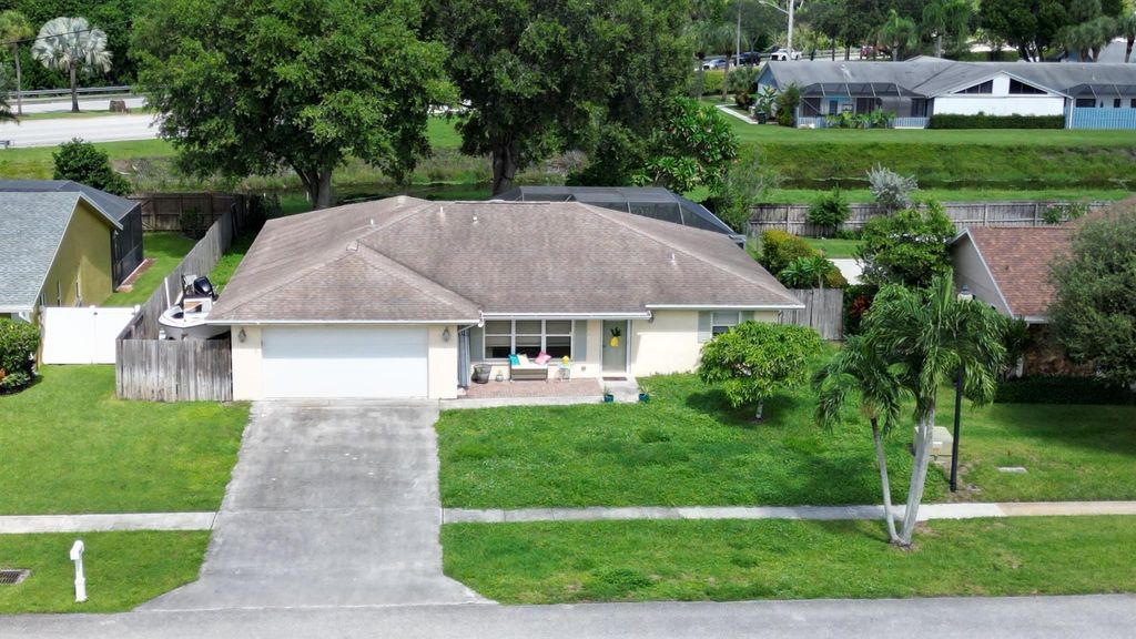 Photo of 5041 Woodstone Circle N, Lake Worth, FL 33463 (MLS # R11123950)