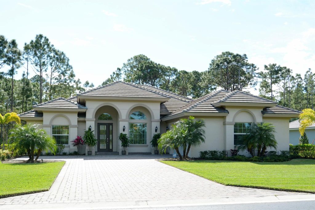 Photo of 9623 Knollwood Lane, Fort Pierce, FL 34951 (MLS # R10959568)