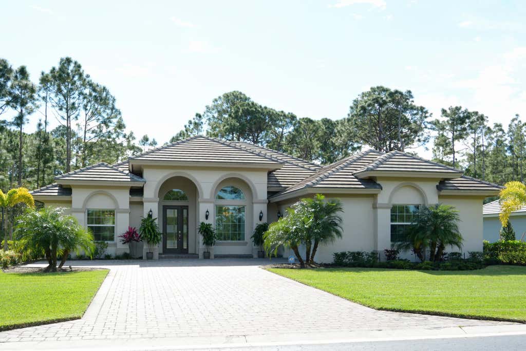 Photo of 9623 Knollwood Lane, Fort Pierce, FL 34951 (MLS # R10959568)