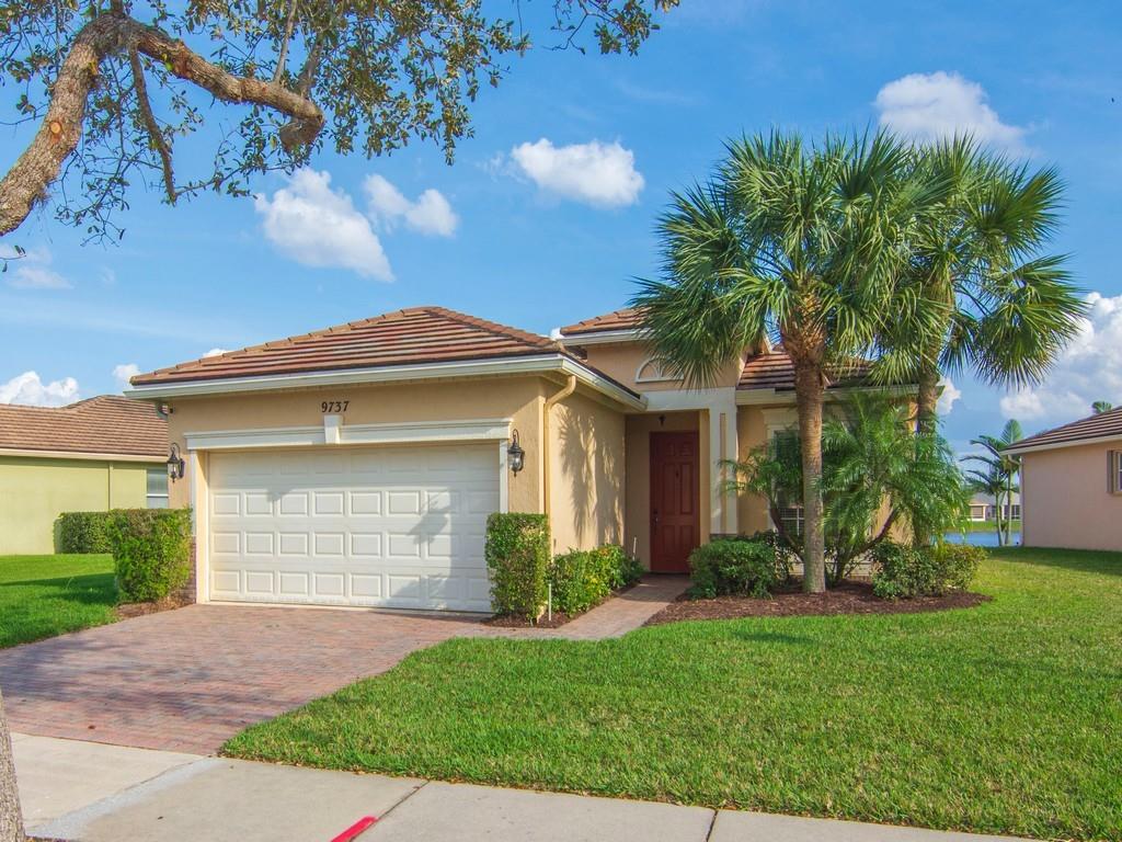 This charming 3-bedroom, 2-bath home in the gated Heritage Oaks community offers comfortable living with a 2-car garage and stylish paver driveway & walkway. Enjoy serene lake views from the covered lanai, perfect for relaxation. Residents benefit from a active community featuring a clubhouse with a pool, hot tub, fitness center, and even a community playground. Conveniently located, this home is close to shopping, ensuring easy access to daily necessities. Heritage Oaks provides a secure and amenity-rich lifestyle, making it an ideal choice for families and those seeking a relaxed environment. Truly a must see!
