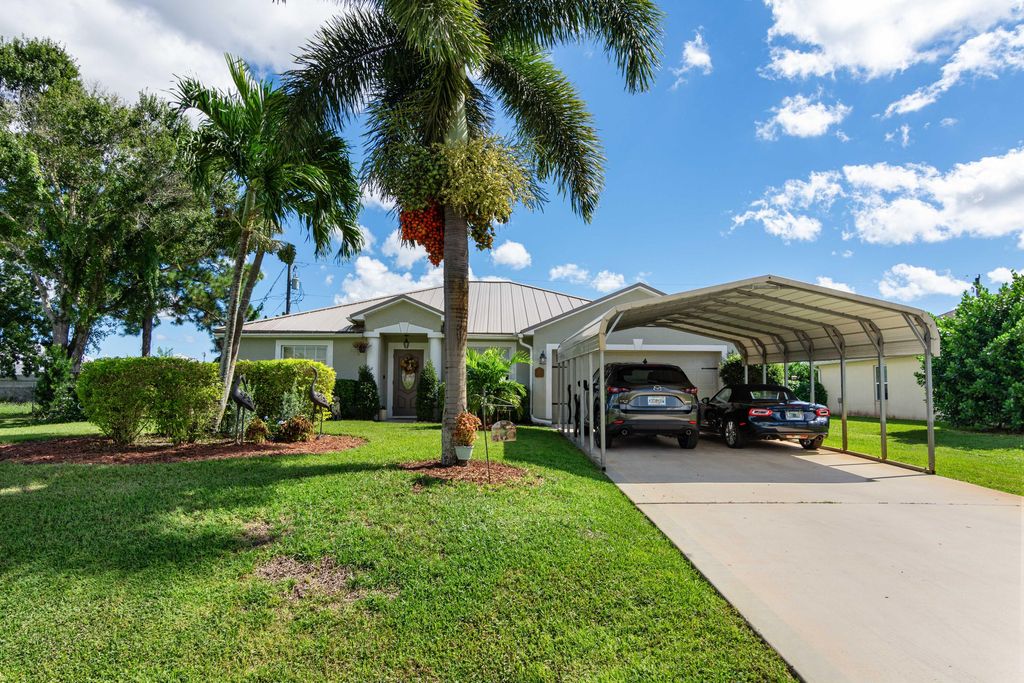 Photo of 1817 SW Davis Street, Port Saint Lucie, FL 34953 (MLS # R11132575)
