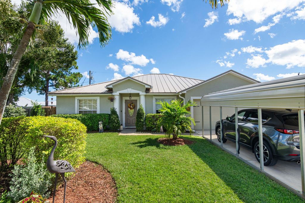 Photo of 1817 SW Davis Street, Port Saint Lucie, FL 34953 (MLS # R11132575)