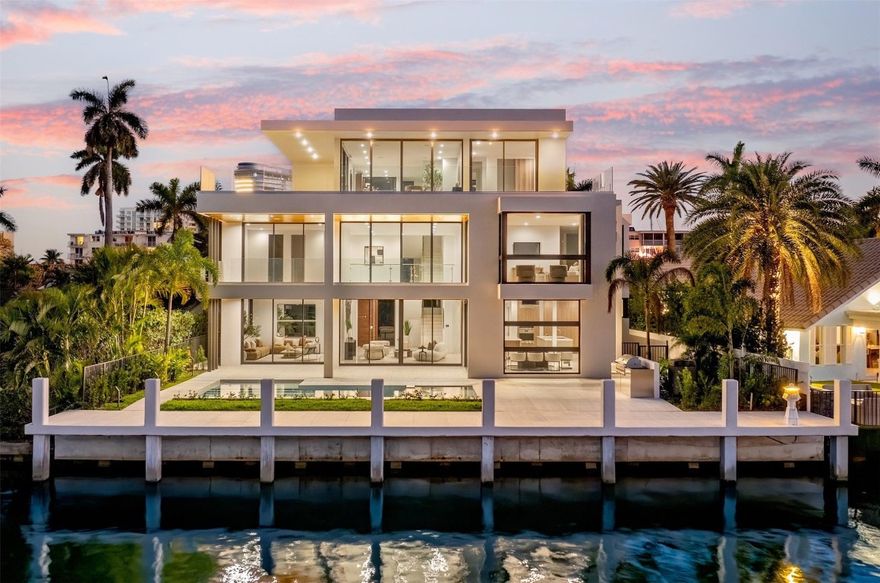 Luxurious three story waterfront estate newly constructed in Lauderdale Harbours. Envisioned by the renowned architect Robert Tuthill and erected in partnership with esteemed builder Jeff Hendricks, this ultra modern residence provides plenty of convertible living space. Seamless flow of indoor and outdoor entertainment environments makes transitioning guests simple. Appreciate the aesthetic 360-degree views of downtown Fort Lauderdale and the Intracoastal Waterways from the wrap around third floor balcony. Sited along deep water and on a wide canal with no fixed bridges, boaters can access open ocean in just 5 minutes. Close proximity to the airport, fine dining, Lauderdale Yacht Club, and the beach. Other features include: 6/7 bedrooms, resort style pool, loggia, and large