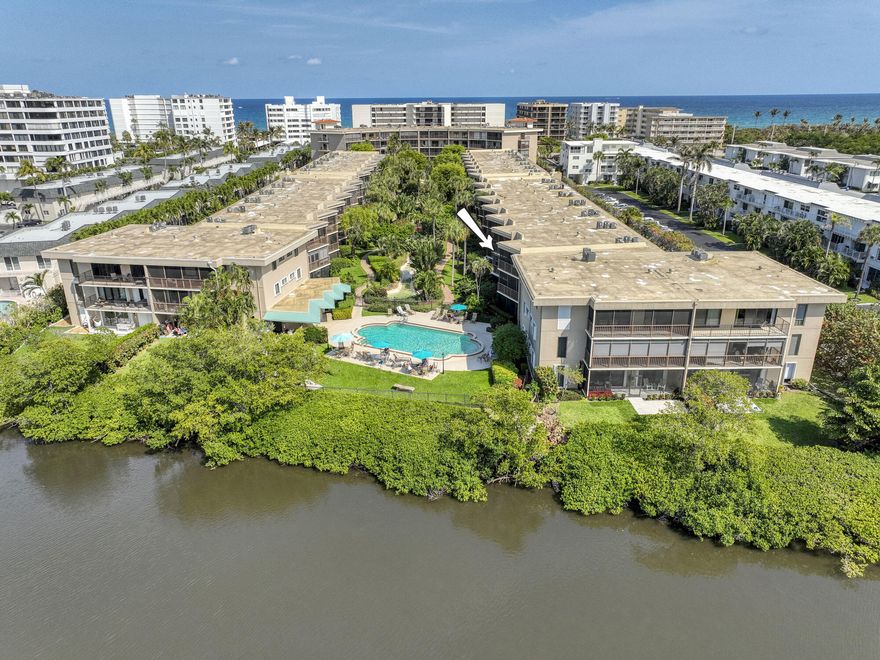 INTRACOASTAL VIEWS await in this stunning 2/2 waterfront condo, fully furnished for seasonal or off-seasonal rentals. The kitchen has white cabinetry, granite countertops, and stainless steel appliances. A spacious living room flows seamlessly to a large balcony, offering breathtaking views of the intracoastal ,pool and lush landscaping. Split bedroom floor plan includes a generous master suite with an ensuite bath, ample storage, plantation shutters, impact windows and doors, plus an in-unit washer and dryer. This peaceful oasis features a serene walkway to the heated pool and sauna, all overlooking the tranquil intracoastal. Perfectly located near Lantana's best amenities, including Palm Beach Island, the Four Seasons, and The Au Palm Beach Resort. Enjoy coastal living just steps from the ocean.
