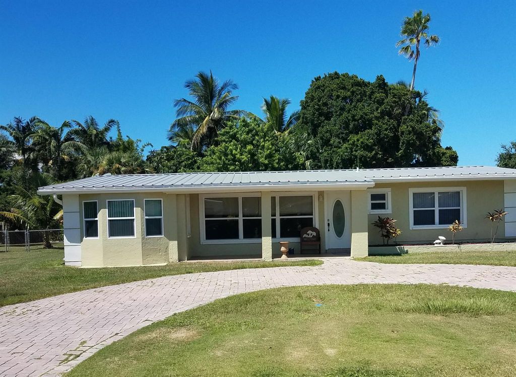 Photo of 1912 Jacaranda Drive, Fort Pierce, FL 34949 (MLS # R10830343)