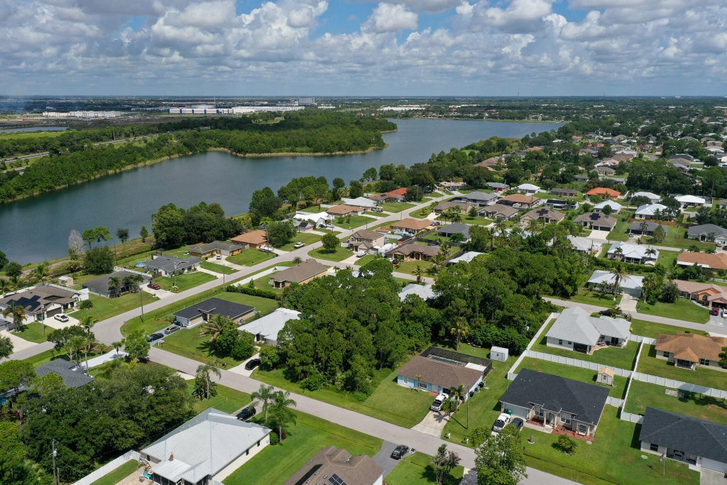 Photo of 1881 SW LOFGREN Avenue, Port Saint Lucie, FL 34953 (MLS # B26069552)