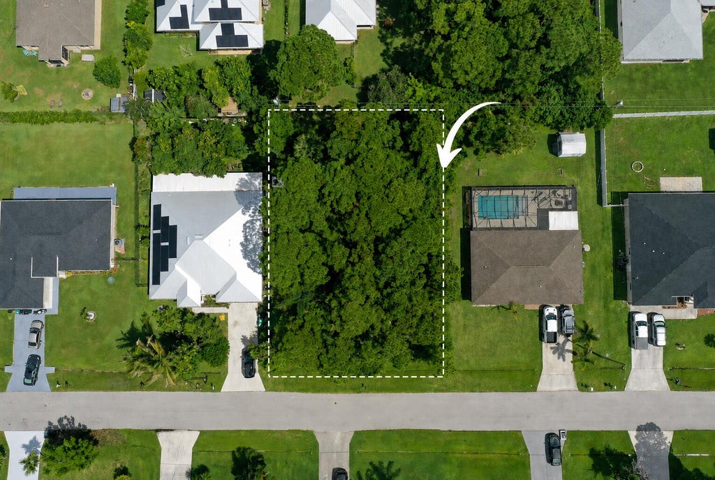 Photo of 1881 SW LOFGREN Avenue, Port Saint Lucie, FL 34953 (MLS # B26069552)