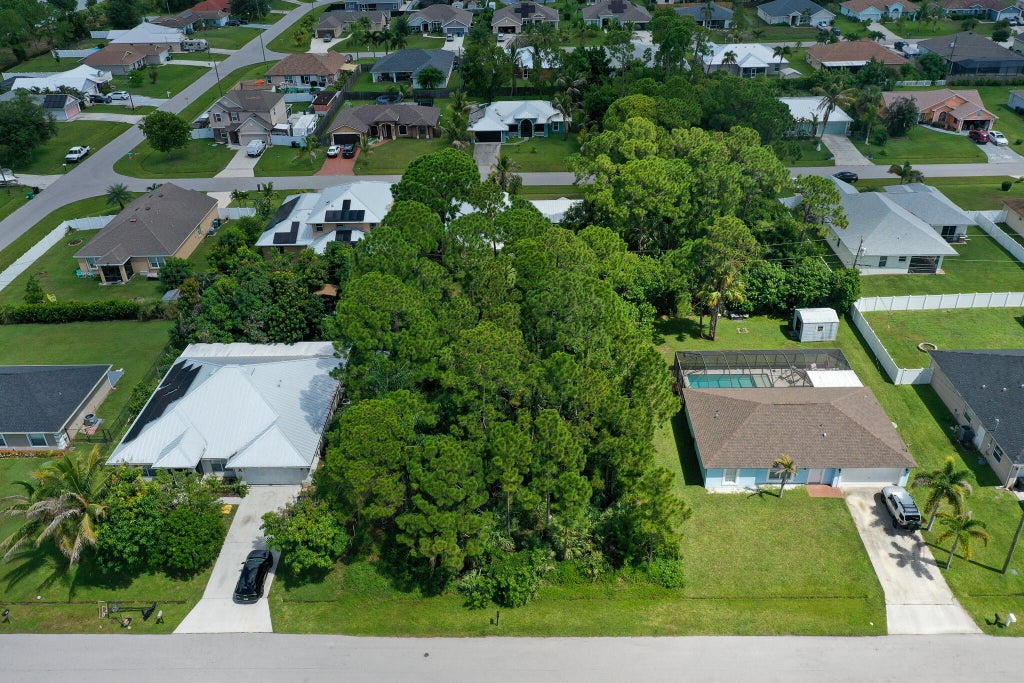 Photo of 1881 SW LOFGREN Avenue, Port Saint Lucie, FL 34953 (MLS # B26069552)