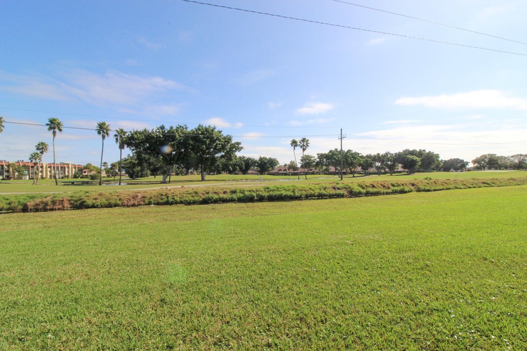Photo of 4692 Lucerne Lakes Boulevard E #104, Lake Worth, FL 33467 (MLS # B26083626)