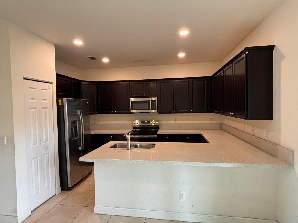 Photo of 4323 Braxton Avenue, West Palm Beach, FL 33417 (MLS # R11152972)