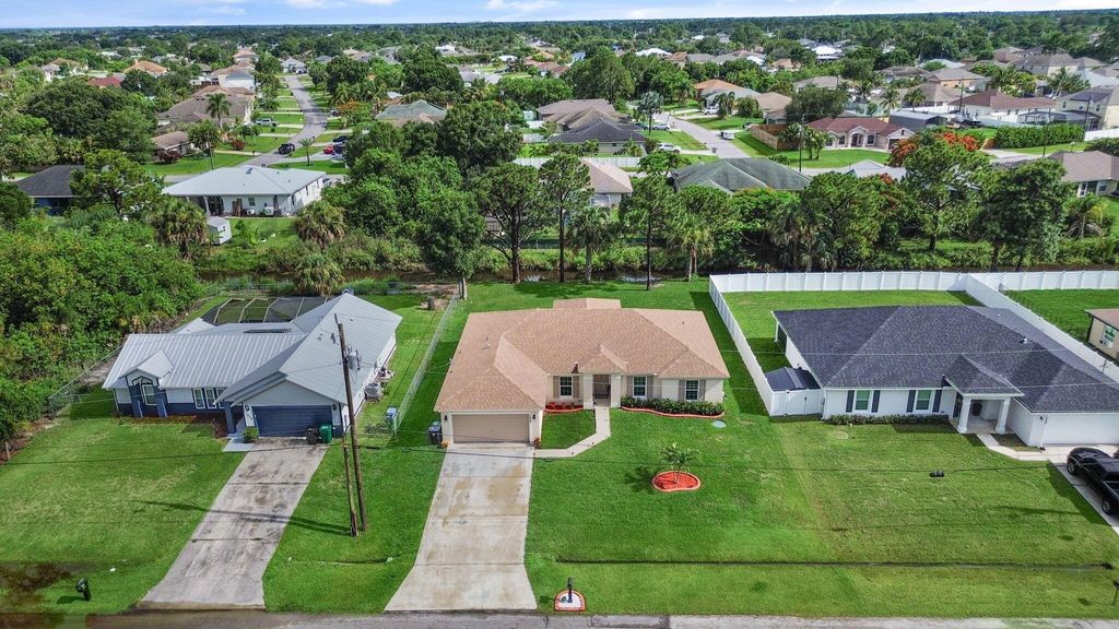 Photo of 1236 SW Mancuso Avenue, Port Saint Lucie, FL 34953 (MLS # R11061592)