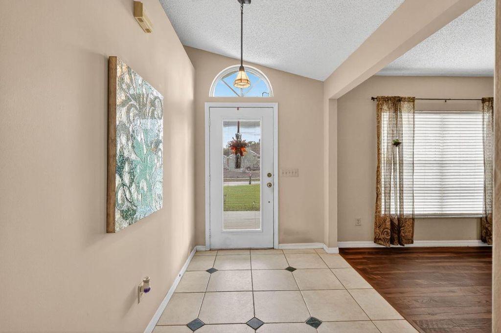 Photo of 1465 SW Dow Lane, Port Saint Lucie, FL 34953 (MLS # R11132765)