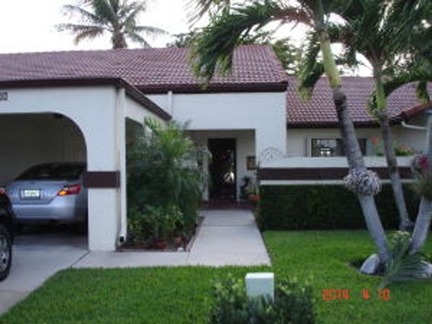 2/2 with carport, partially furnished, on beautiful lake in desirable Parkwalk, which is part of The Landings in Aberdeen East.  Pavered front atrium with colorful flowers and gardens, which can be viewed from the dining room.  Unit has sliding glass doors onto the patio from the living room, kitchen, and master bedroom, which allow for beautiful sunset views over the lake. Accordion hurricane shutters. Wall unit in second bedroom, kitchen table and chairs in kitchen, and all of the patio furniture are included.