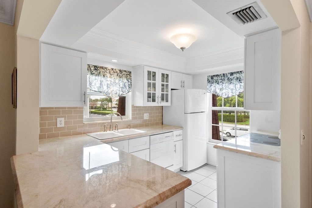 Photo of 10040 Meridian Way N #206, Palm Beach Gardens, FL 33410 (MLS # R10947229)