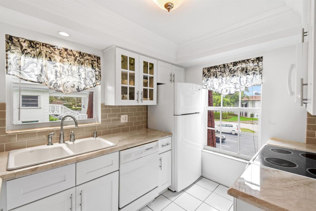 Photo of 10040 Meridian Way N #206, Palm Beach Gardens, FL 33410 (MLS # R10947229)