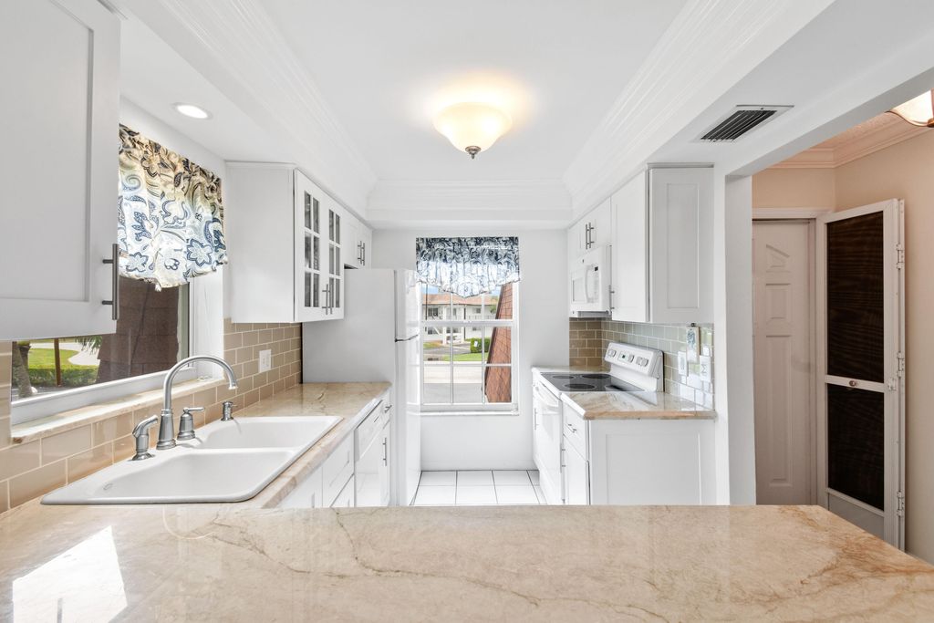 Photo of 10040 Meridian Way N #206, Palm Beach Gardens, FL 33410 (MLS # R10947229)