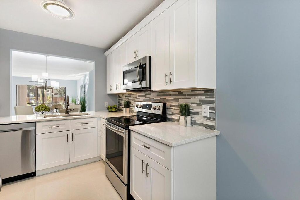 Photo of 10204 Mangrove Drive #104, Boynton Beach, FL 33437 (MLS # R11132004)