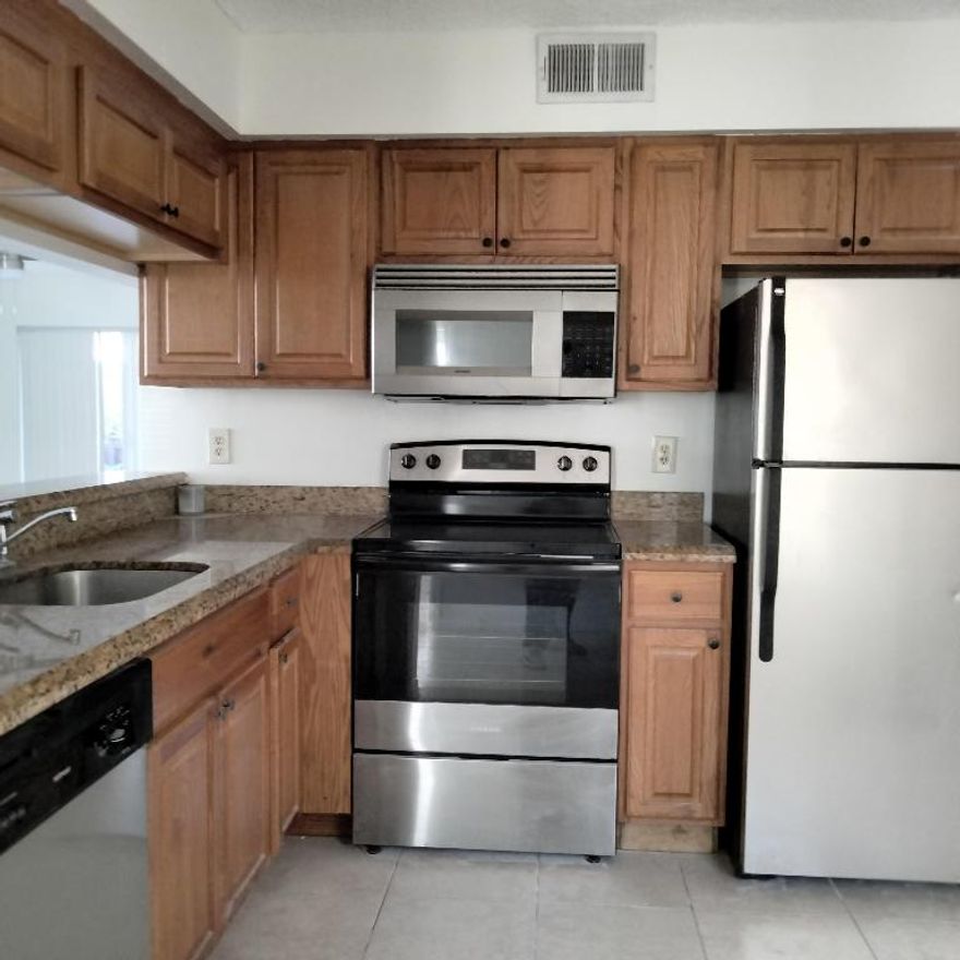 FIRST FLOOR, 2bR/2bth CONDO WITH GRANITE COUNTER TOPS, TILED FLOORS, NEWER APPLIANCES. SCREENED PATIO. PETS 25LB ARE WELCOME. ONE ASSIGNED PARKING. WATER IS INCLUDED. 675+ CR.SCORE . GATED COMMUNITY 'STERLING' OFFERS POOL, GYM, CLUB HOUSE. CLOSE TO I-95, PB AIRPORT, PB OUTLET, CITYPLACE.