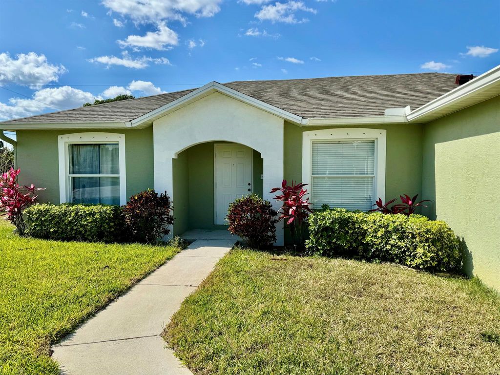 Photo of 452 SW Tarra Avenue, Port Saint Lucie, FL 34953 (MLS # R10981815)