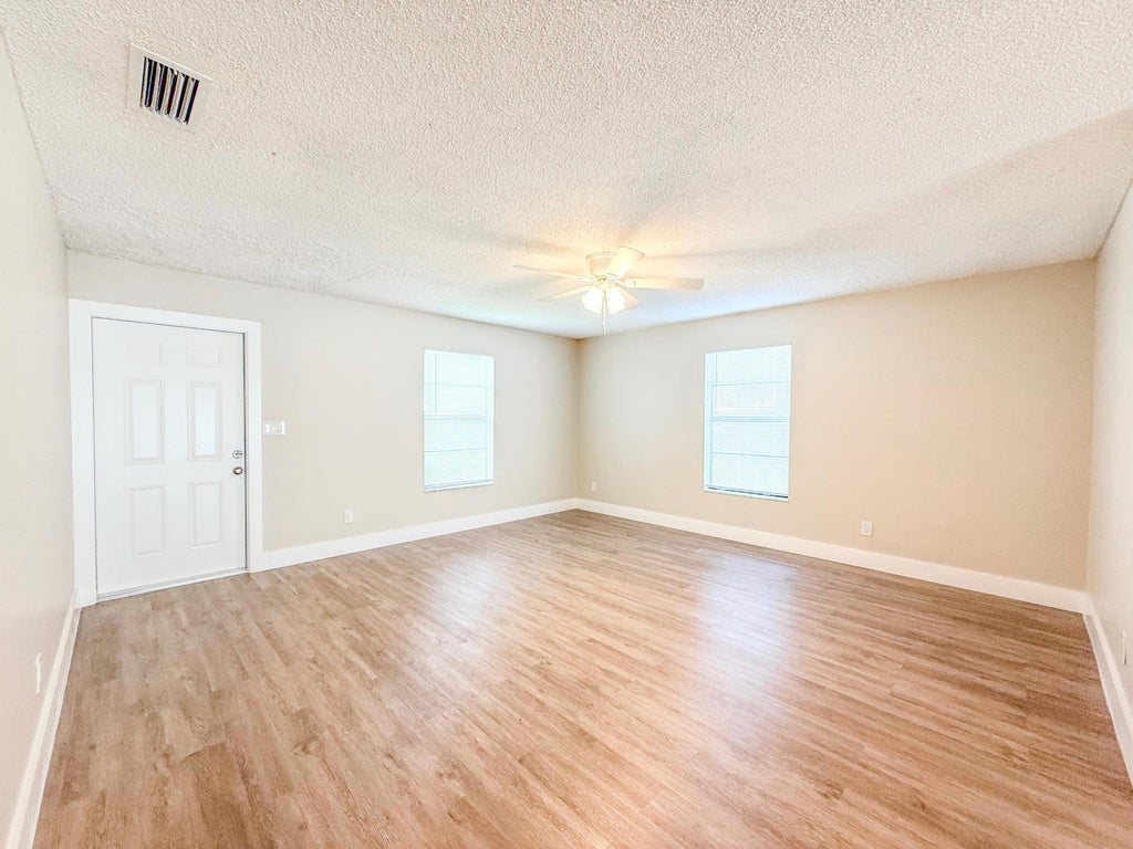Photo of 3082 Swain Boulevard, Greenacres, FL 33463 (MLS # B26050518)