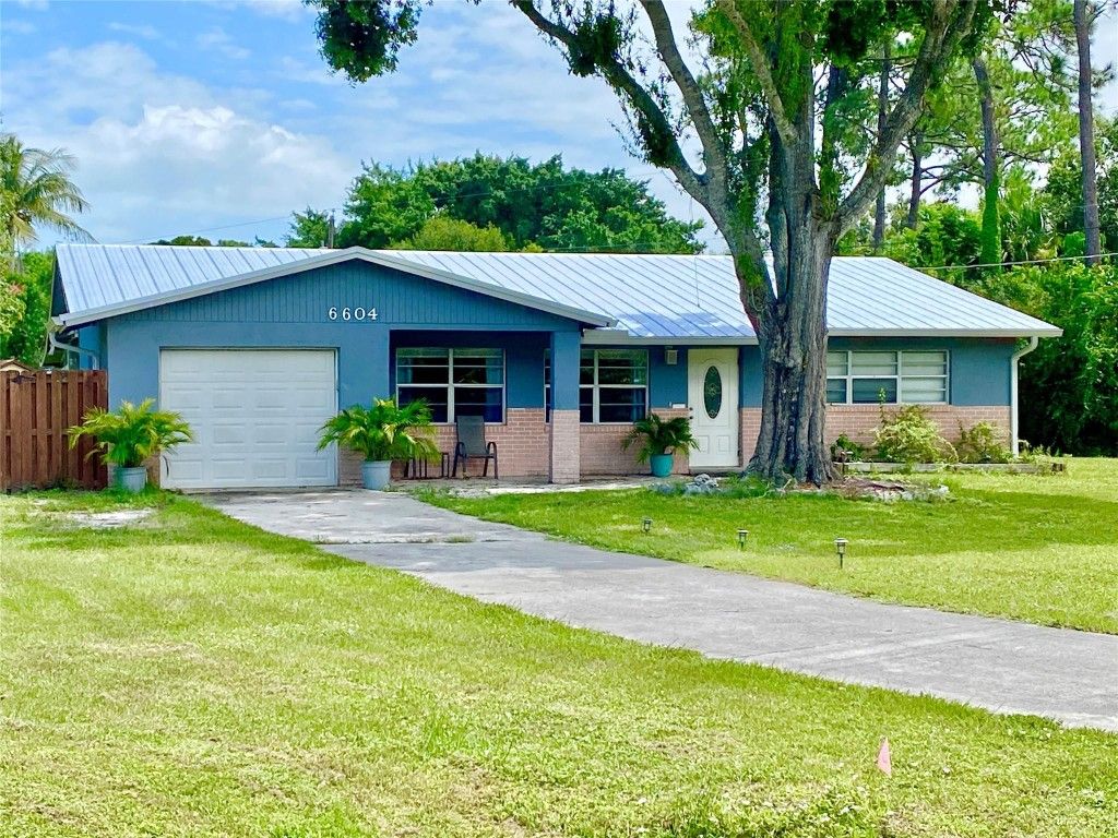 Photo of 6604 Deleon Ave, Fort Pierce, FL 34951 (MLS # F10409370)