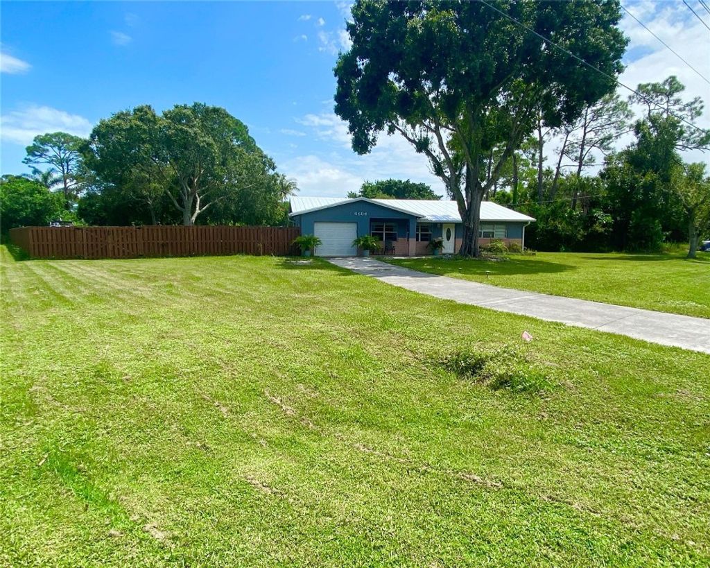 Photo of 6604 Deleon Ave, Fort Pierce, FL 34951 (MLS # F10409370)
